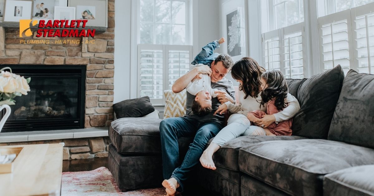 A family enjoying themselves at home.